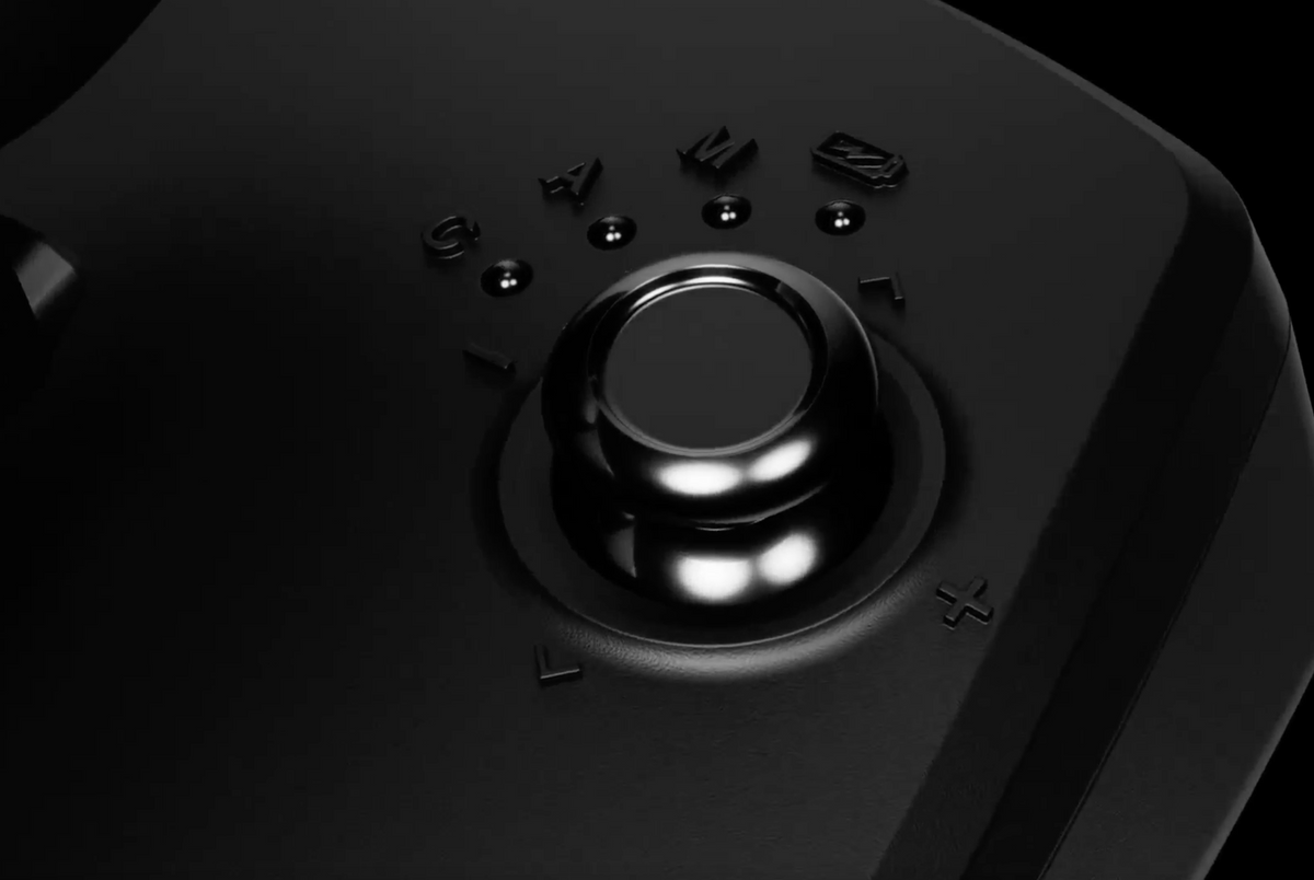 Close-up of the Erojoy X3 control joystick and mode buttons